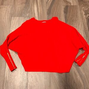 Carmen Red Batwing Sweater Size Small
Zipper accents on sleeves